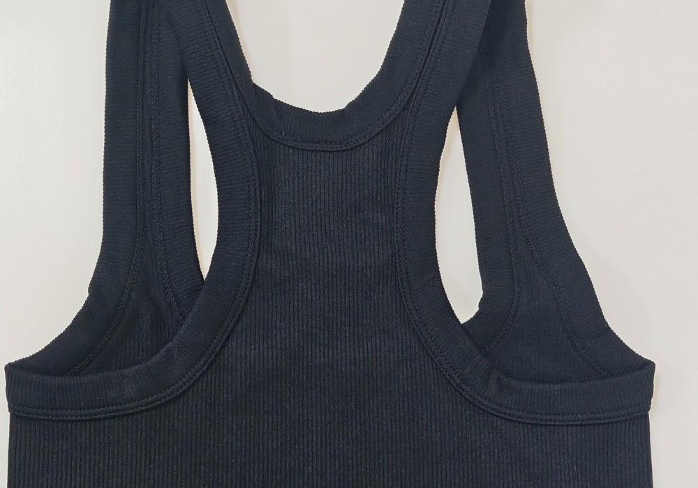 Close-up of the racerback construction and binding on style 3233